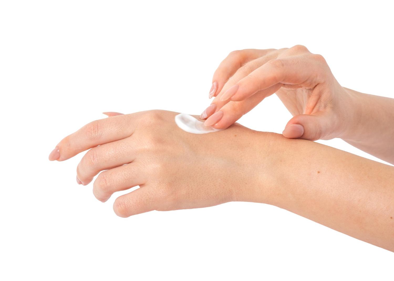 Small amount of personal care product being applied to the back of a hand