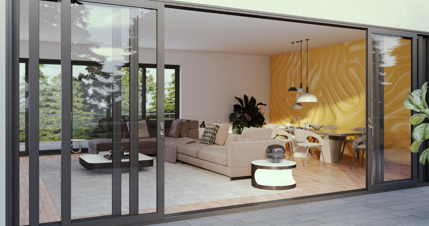 Wide glass doorway opening onto a furnished living and dining area